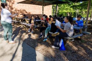 Students playing trivia outside