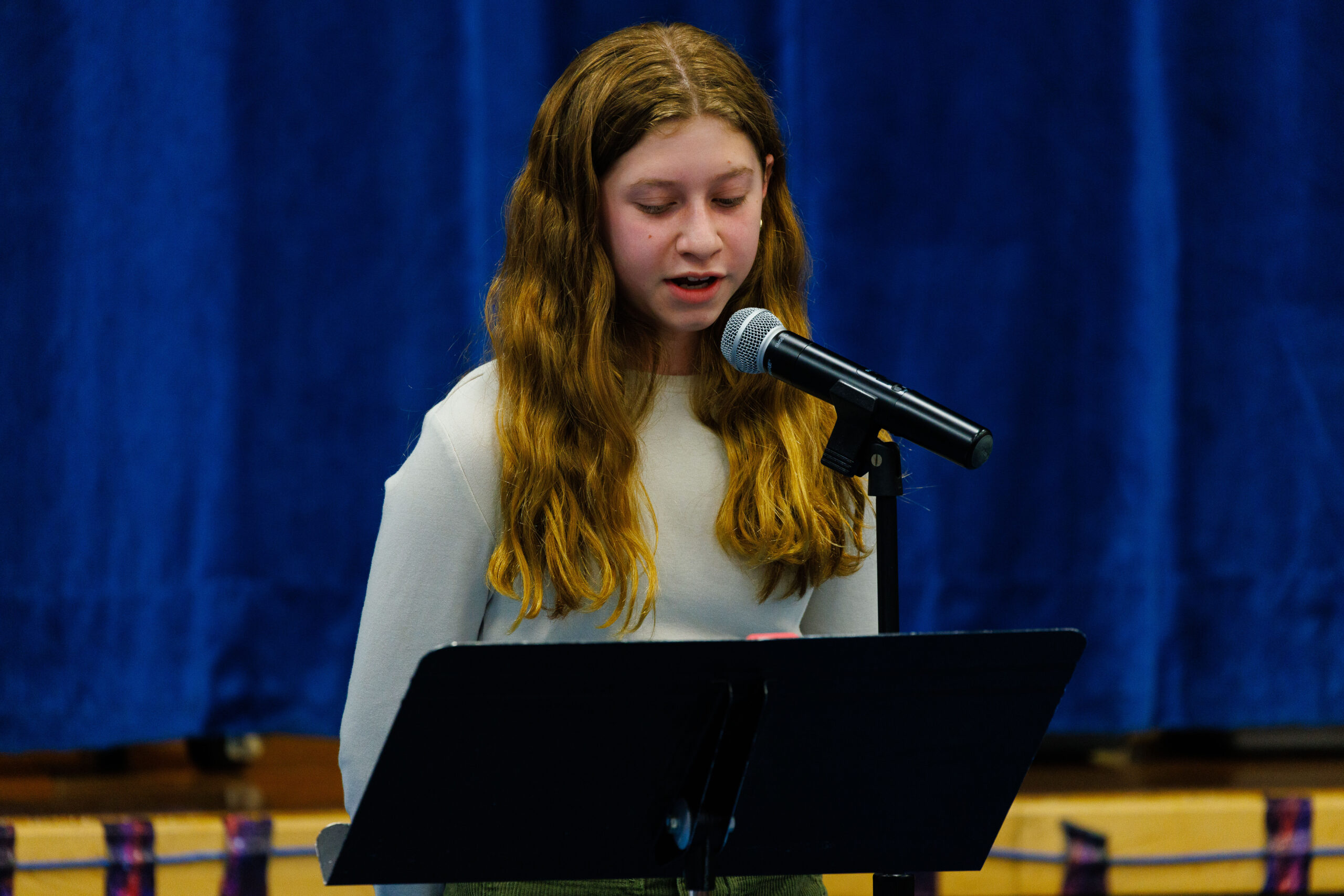 Student reciting poem
