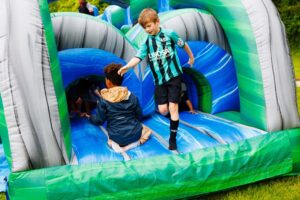 children on inflatable