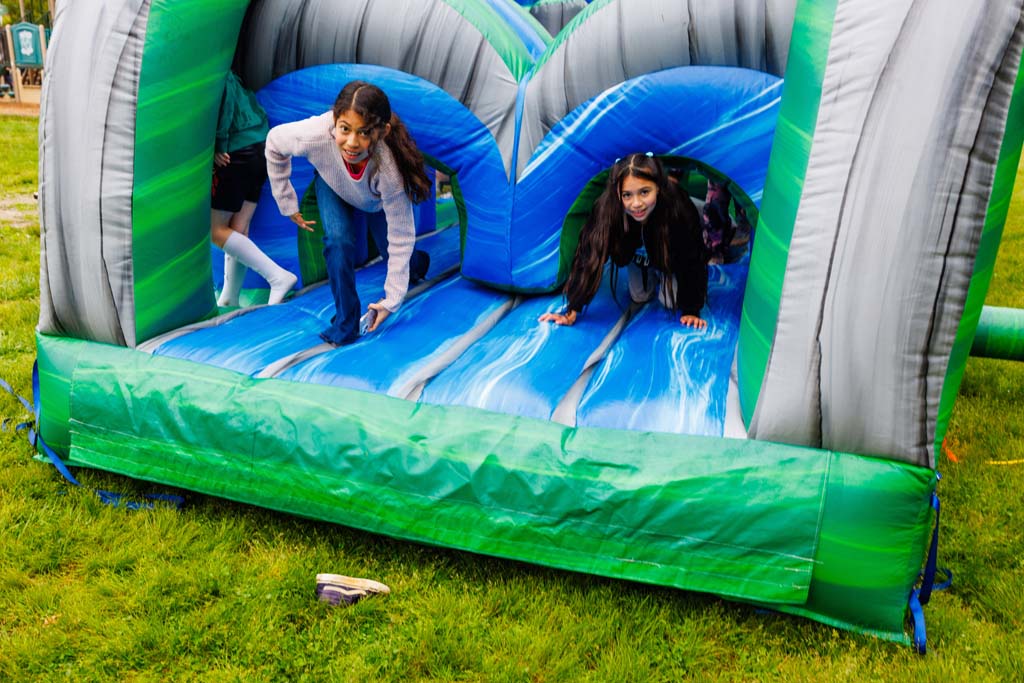 children on inflatable