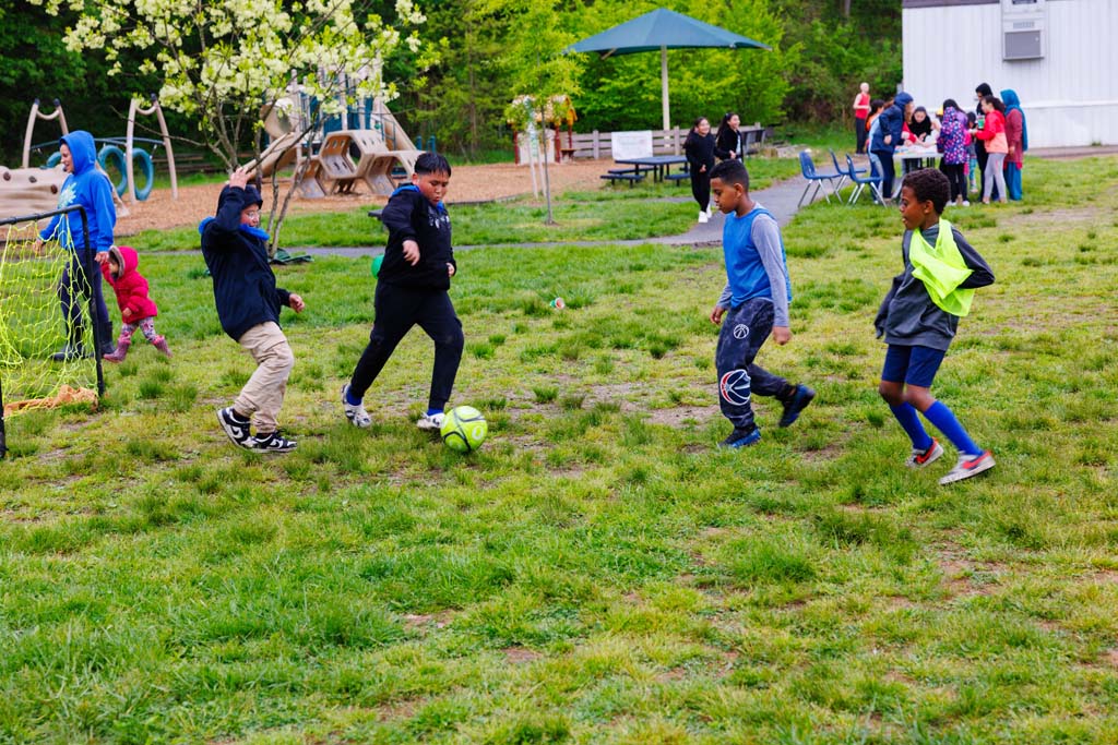 students playing soccer