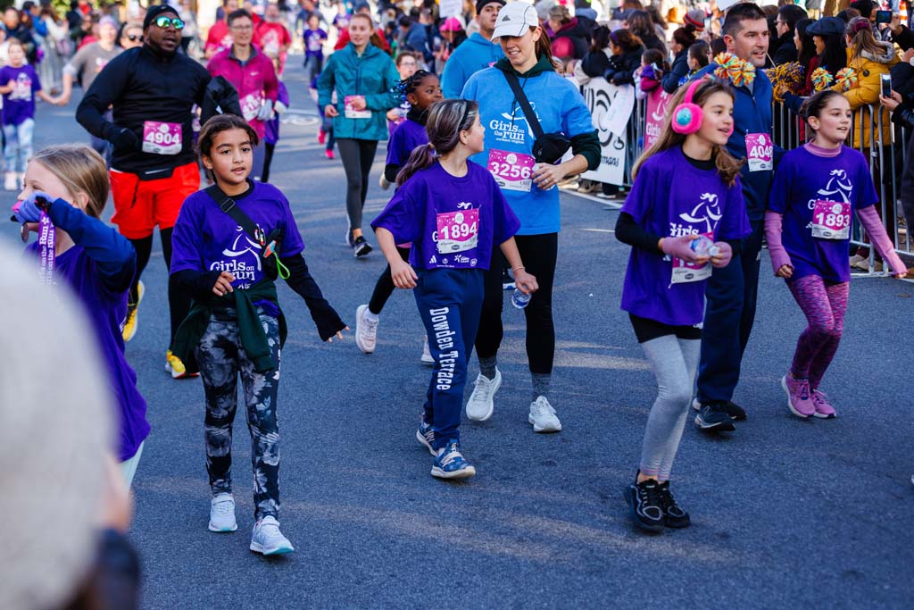 children and adults running