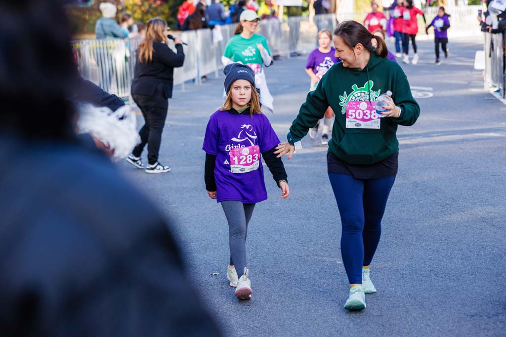 children and adults running