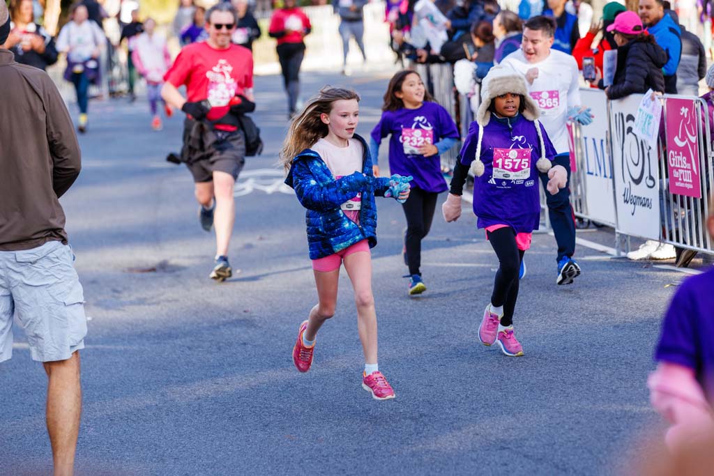 children and adults running