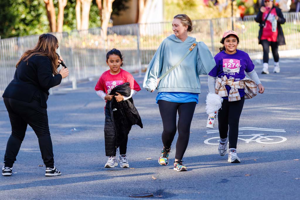 children and adults running