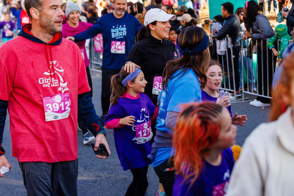 children and adults running