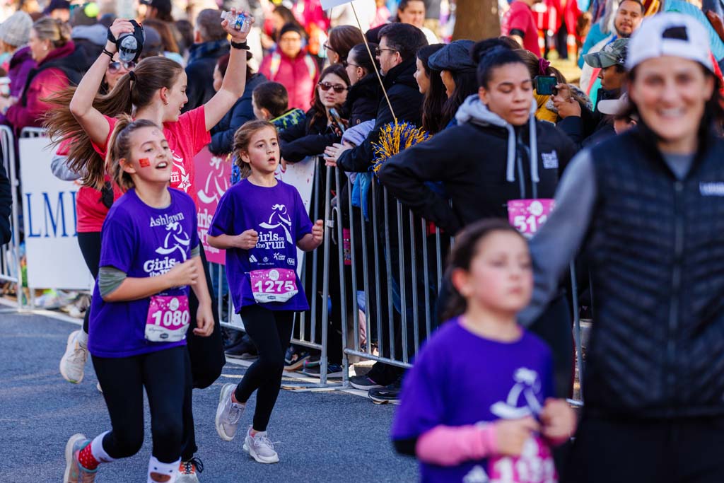 children and adults running