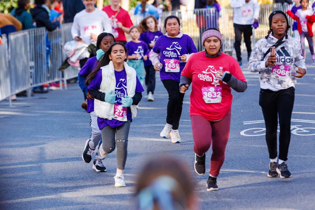 children and adults running