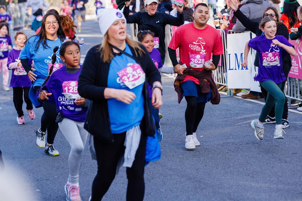 children and adults running