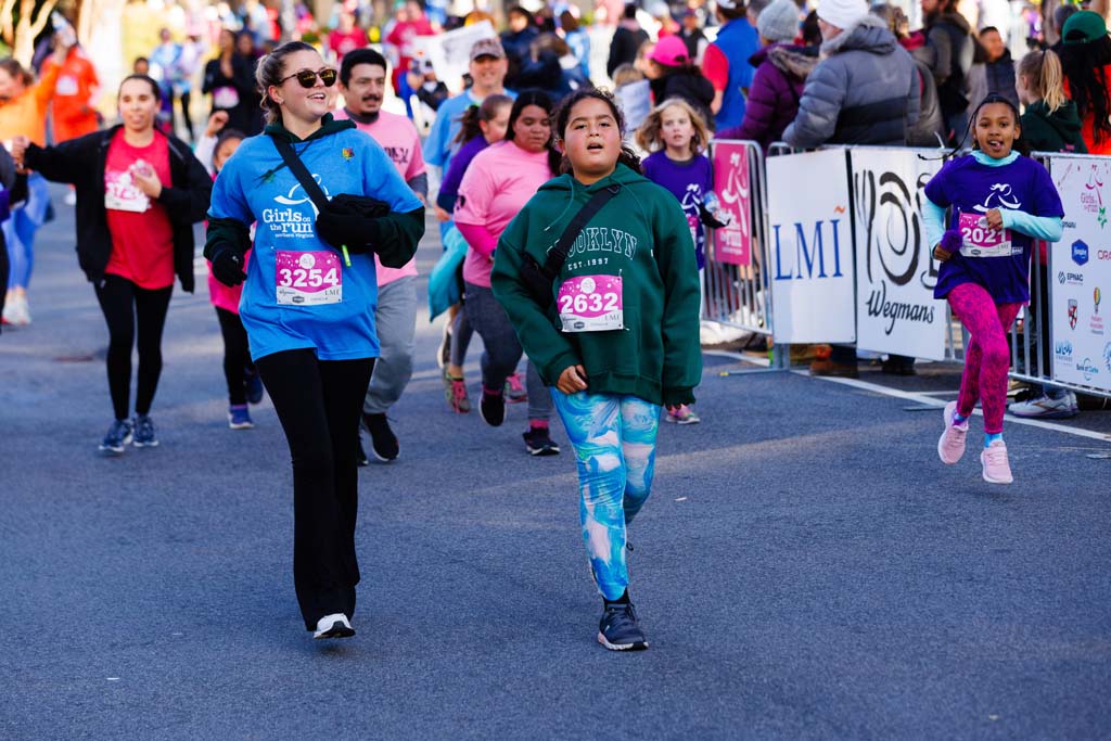 children and adults running