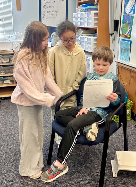 students presenting work