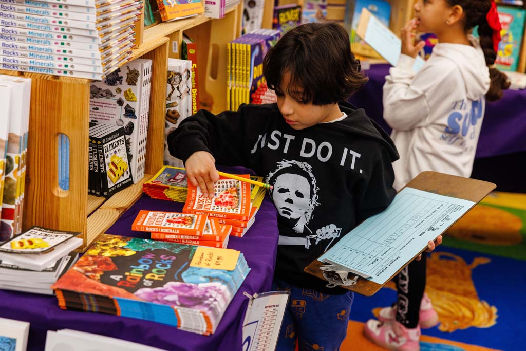 students browsing book fair