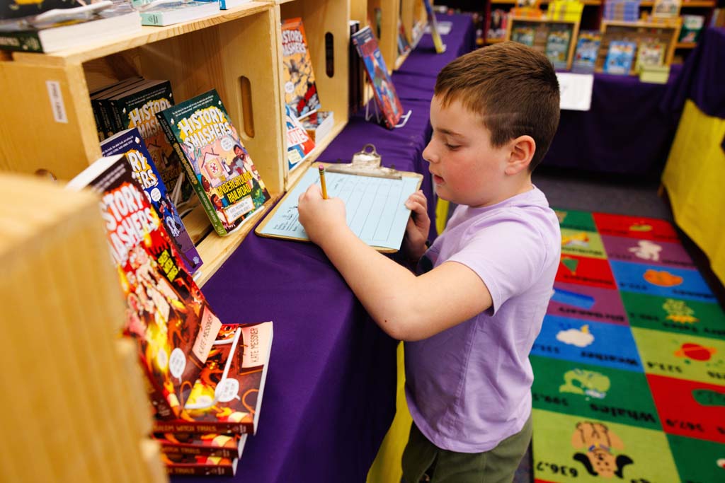 students browsing book fair