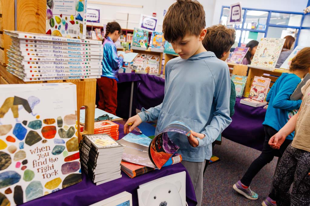 students browsing book fair