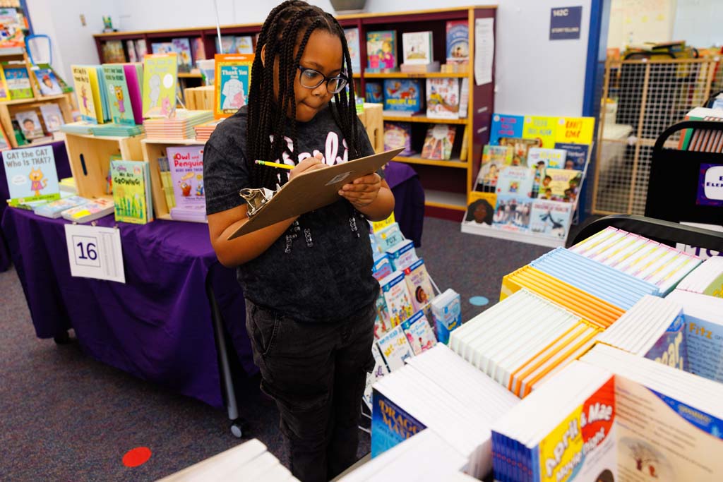 students browsing book fair