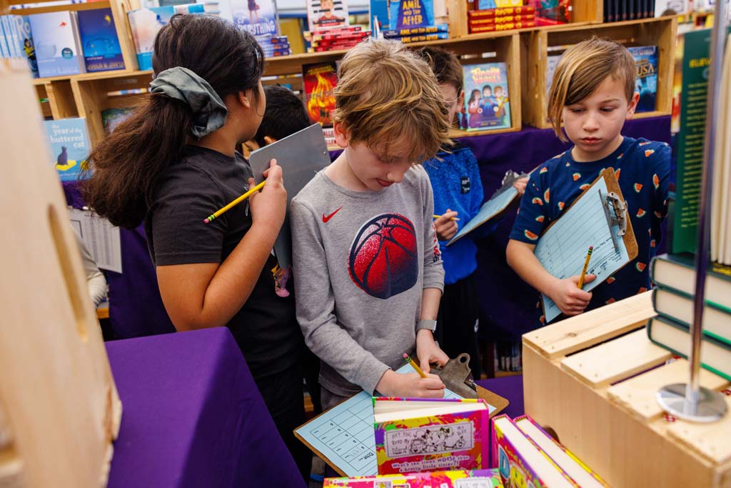 students browsing book fair