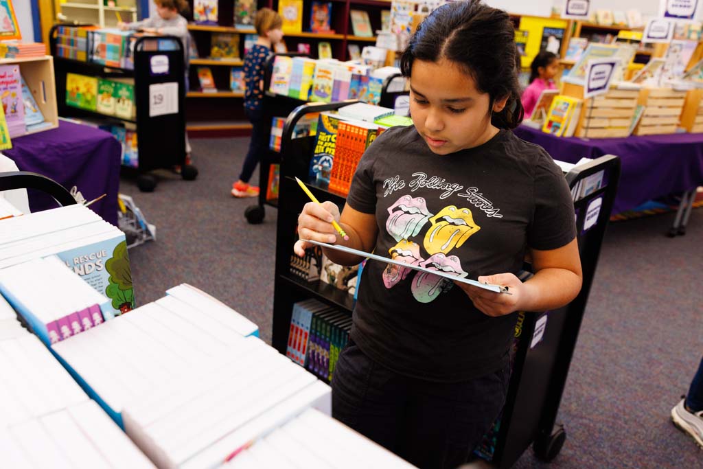 students browsing book fair