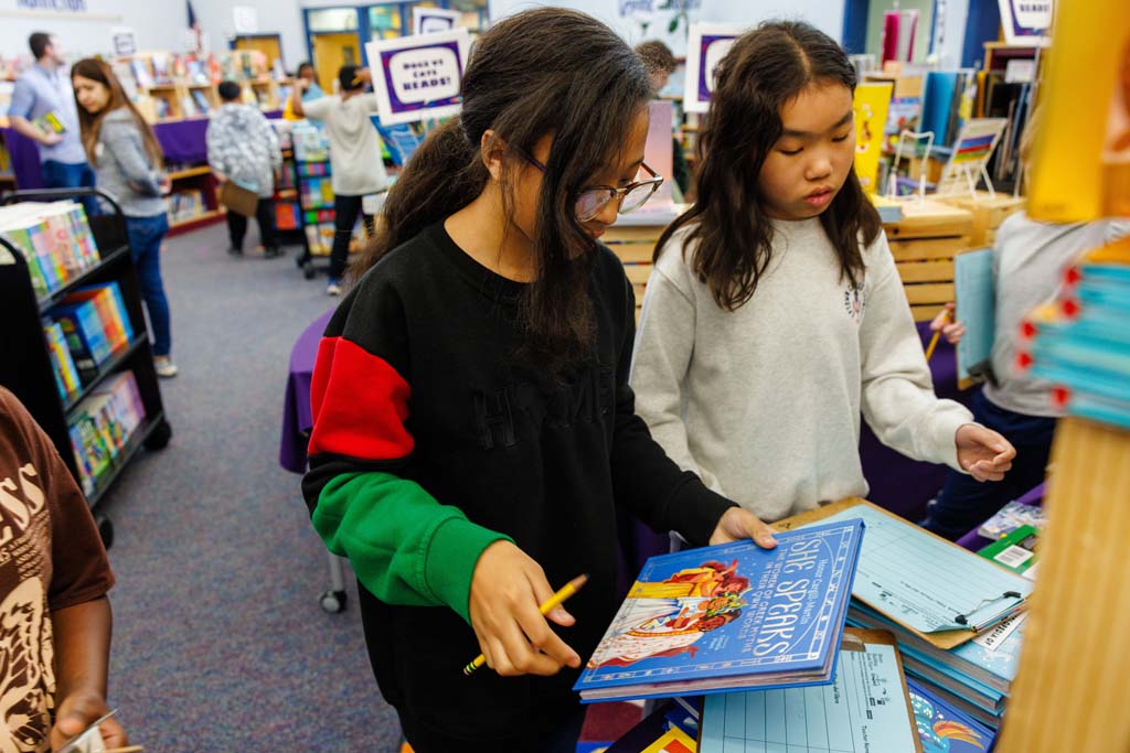 students browsing book fair