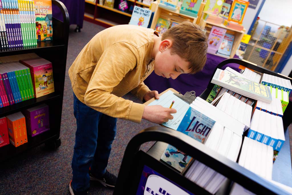students browsing book fair
