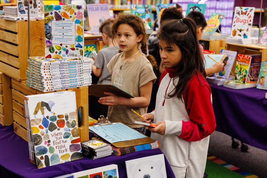 students browsing book fair