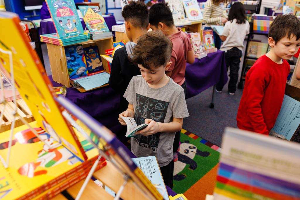 students browsing book fair