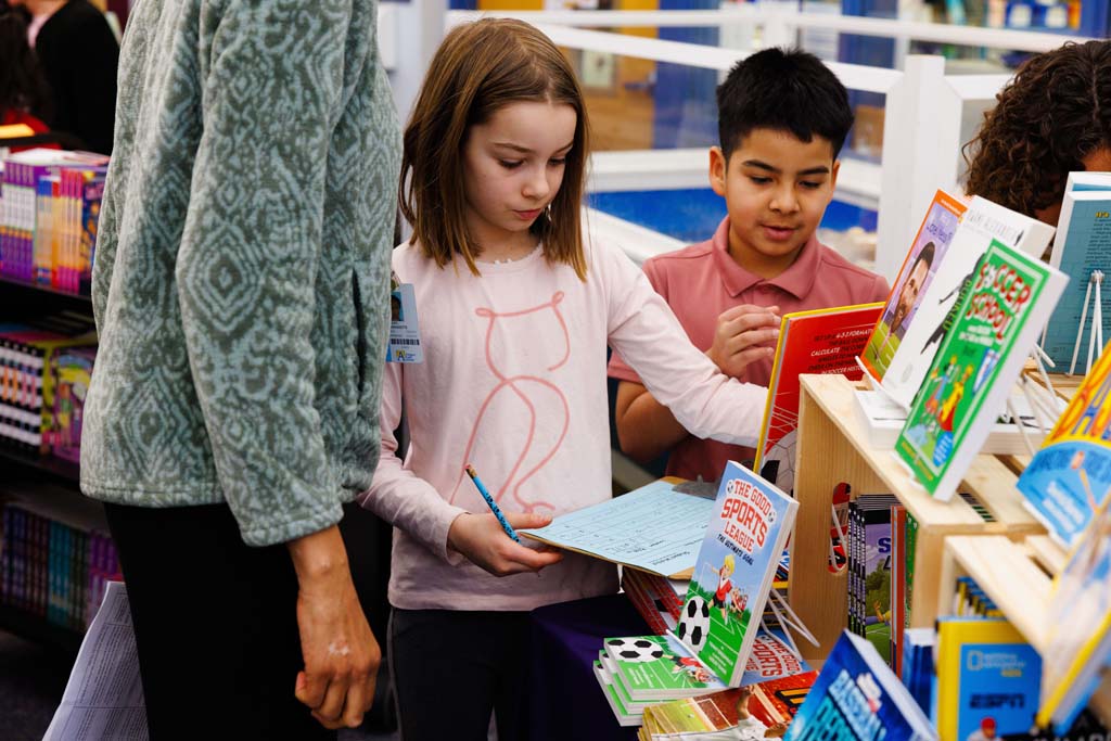 students browsing book fair
