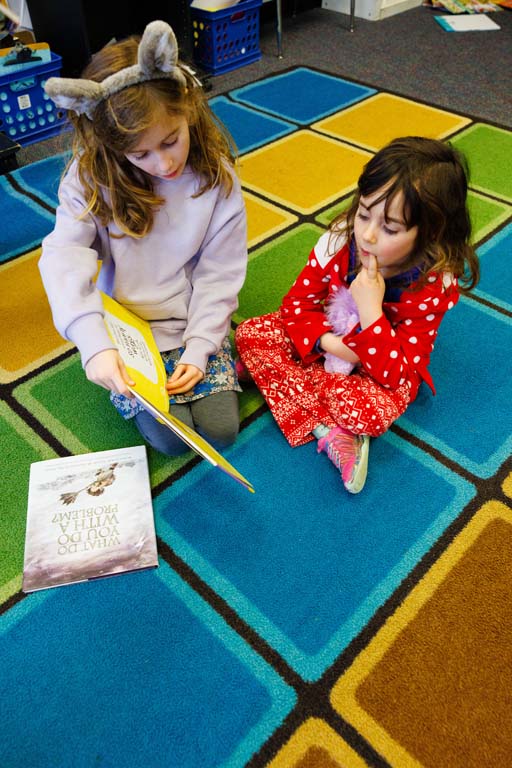 students reading together