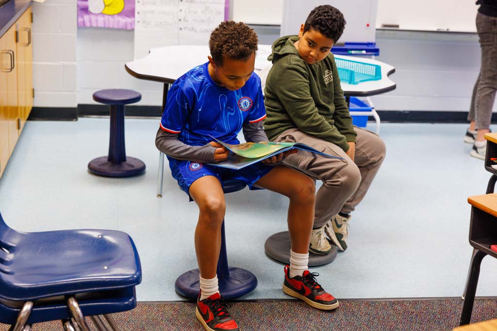 students reading together