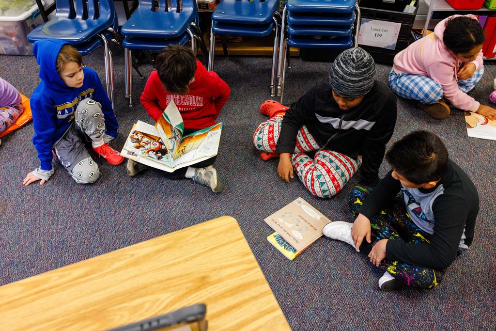 students reading together