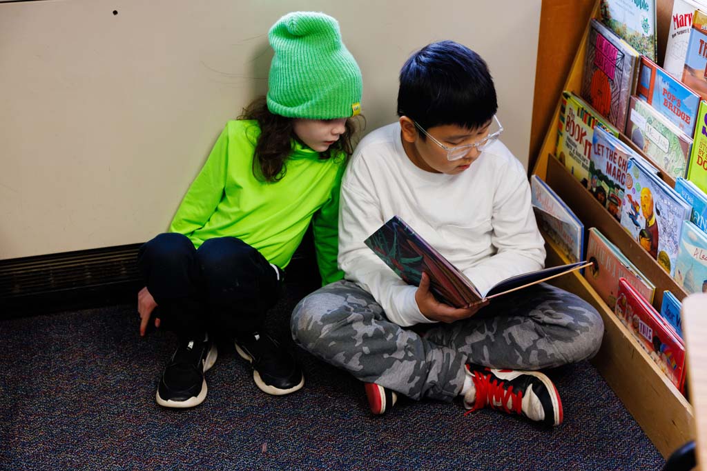 students reading together