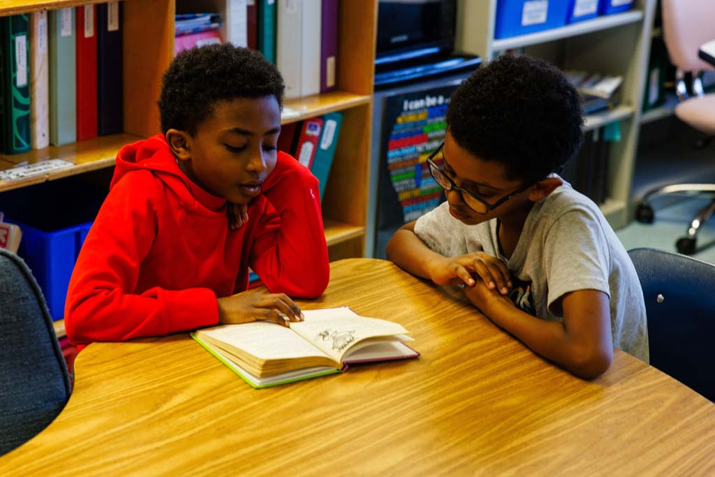students reading together