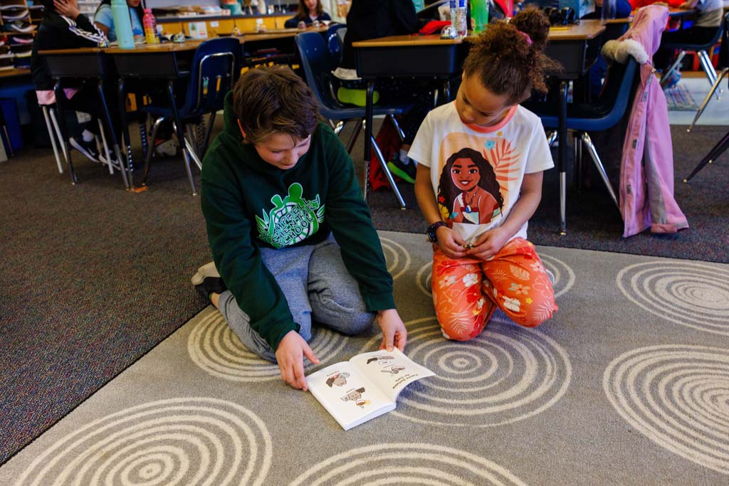 students reading together