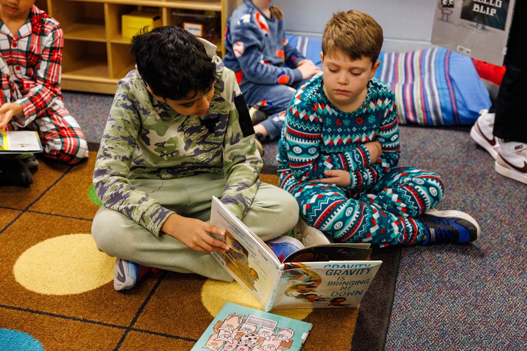 students reading together