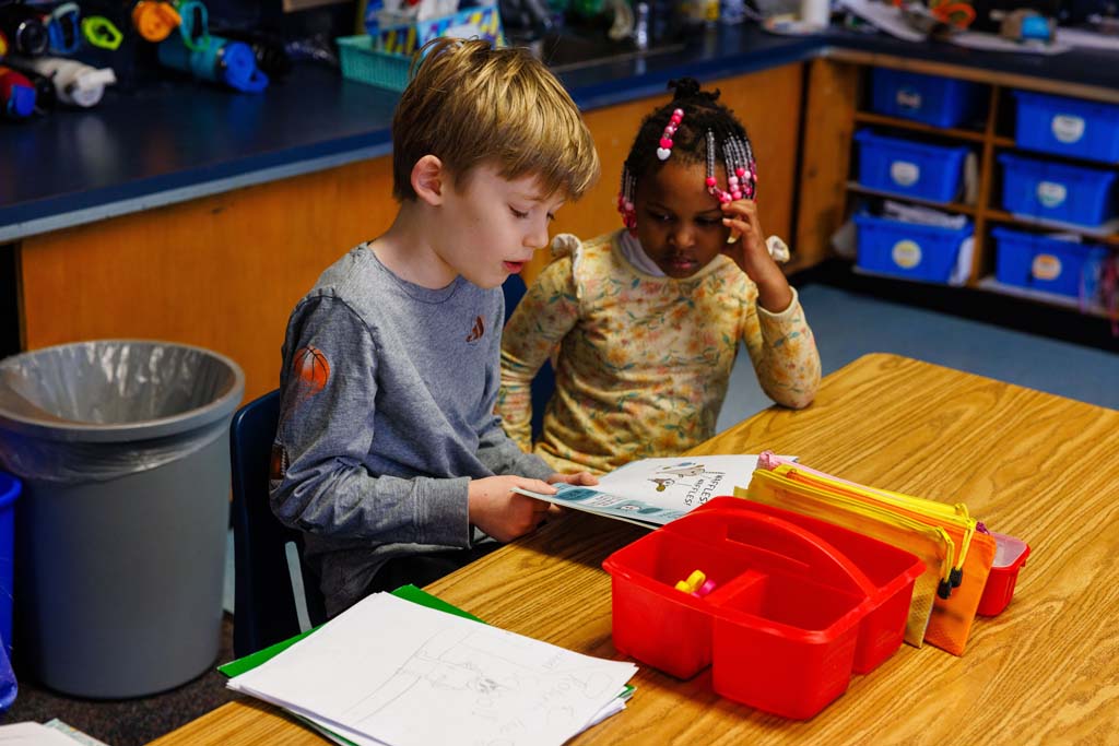 students reading together