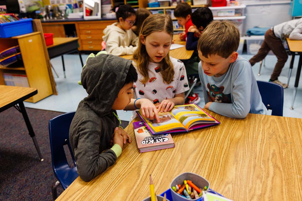 students reading together