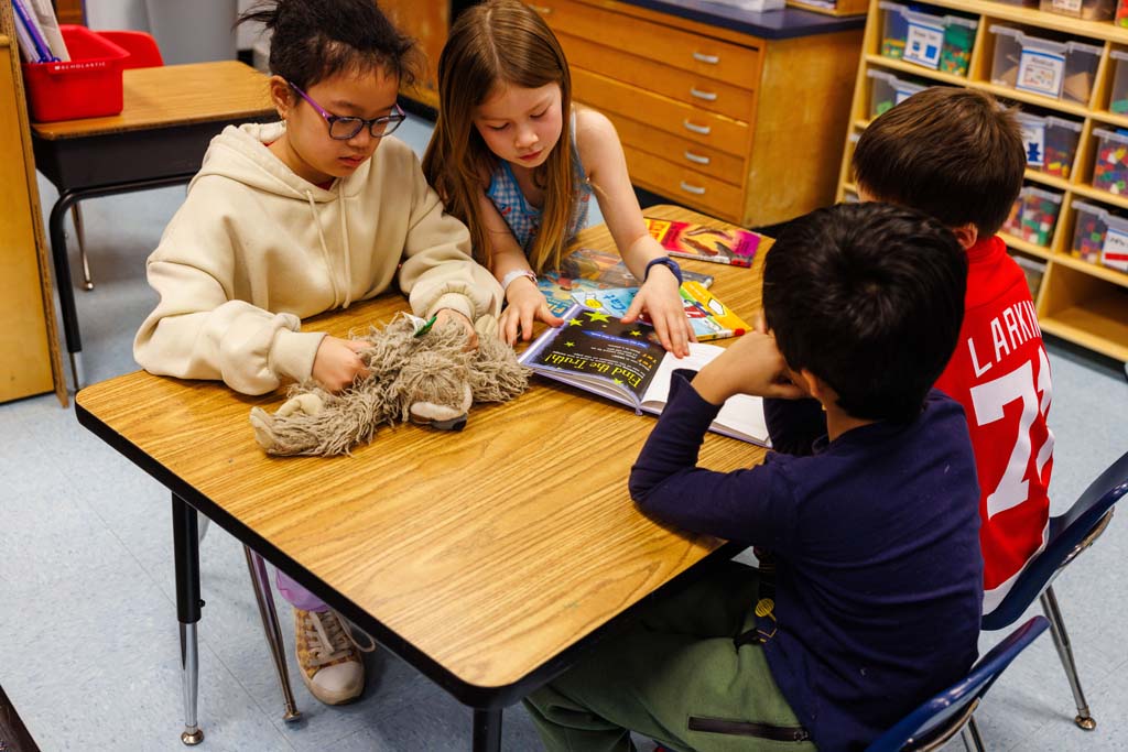 students reading together