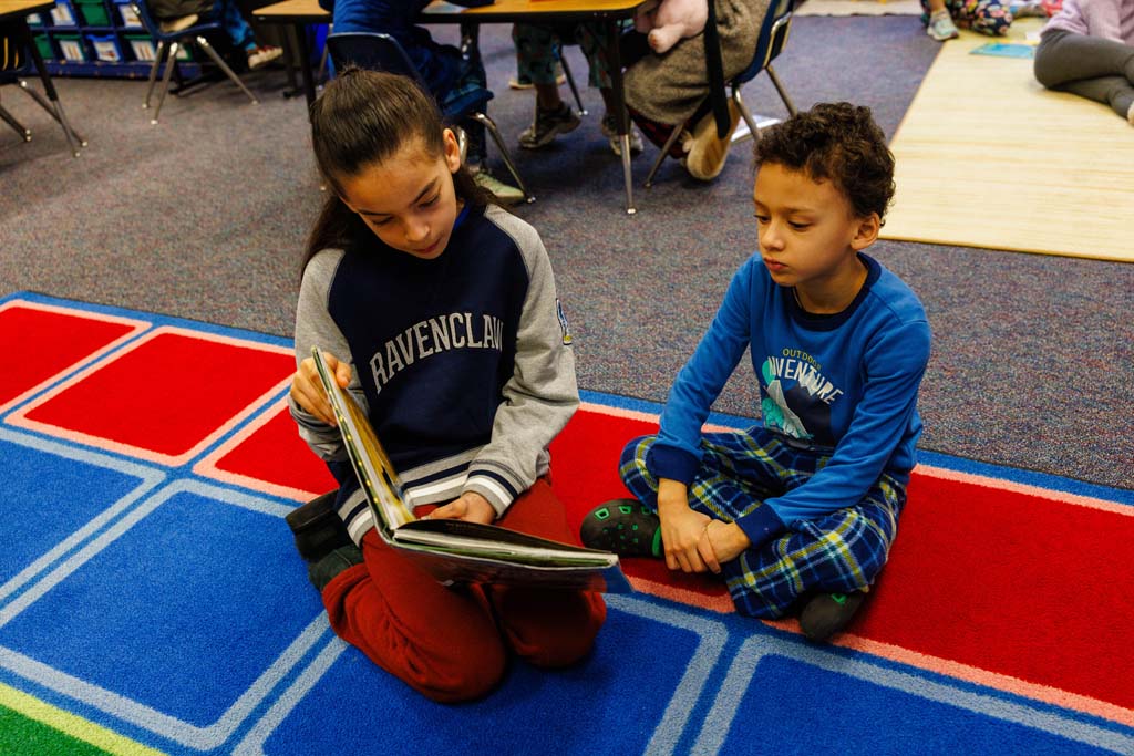 students reading together