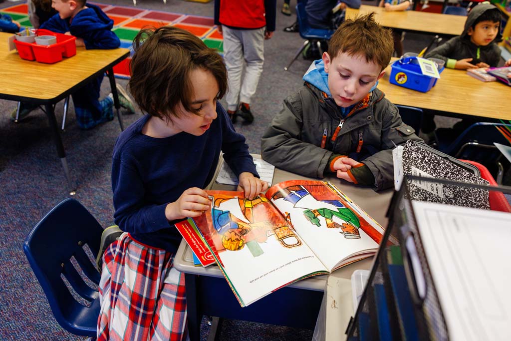 students reading together