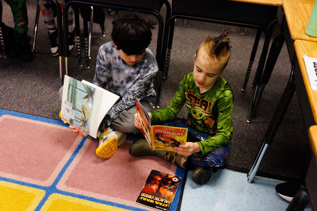 students reading together