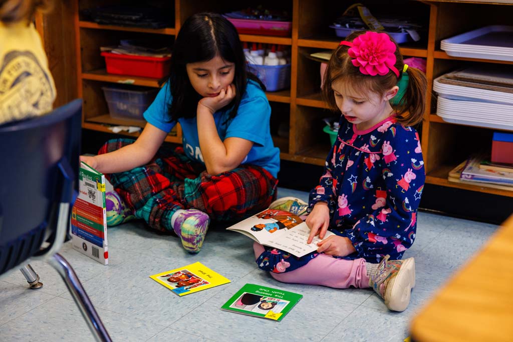students reading together
