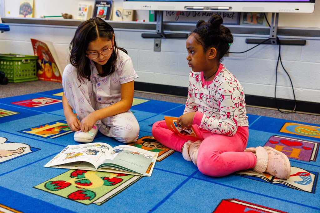 students reading together