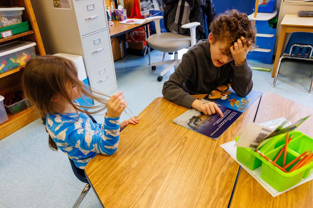 students reading together