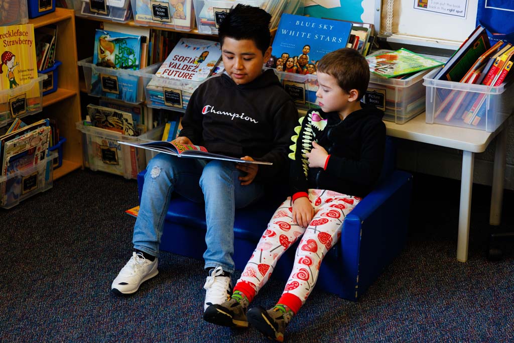 students reading together
