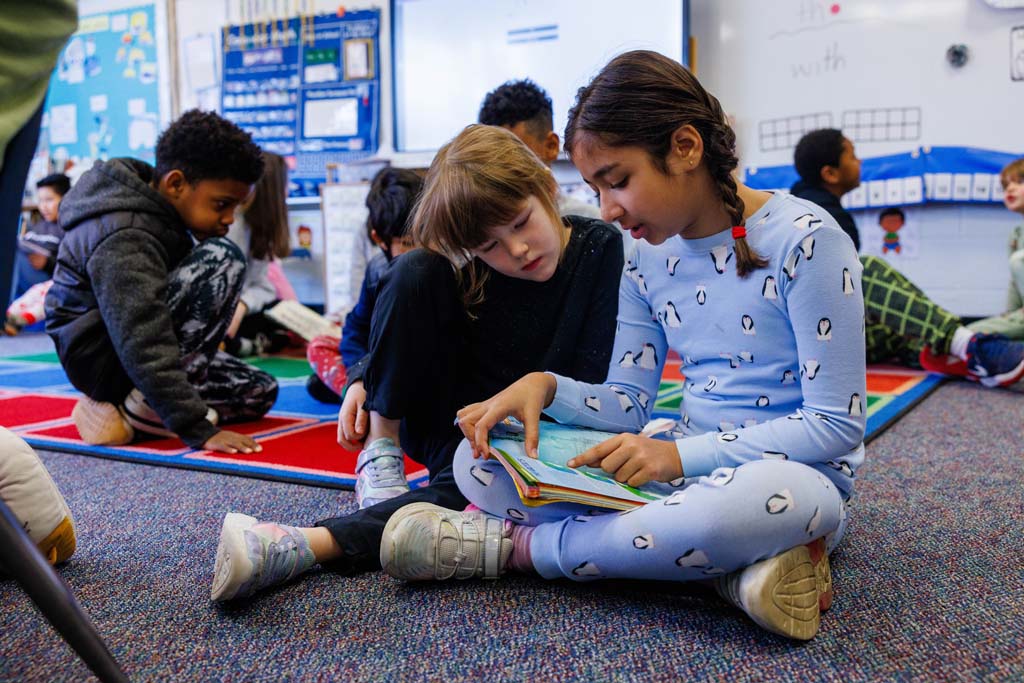 students reading together