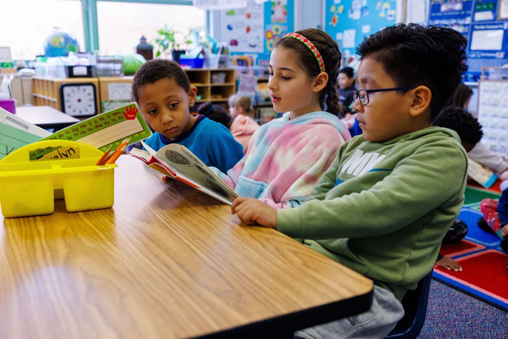 students reading together