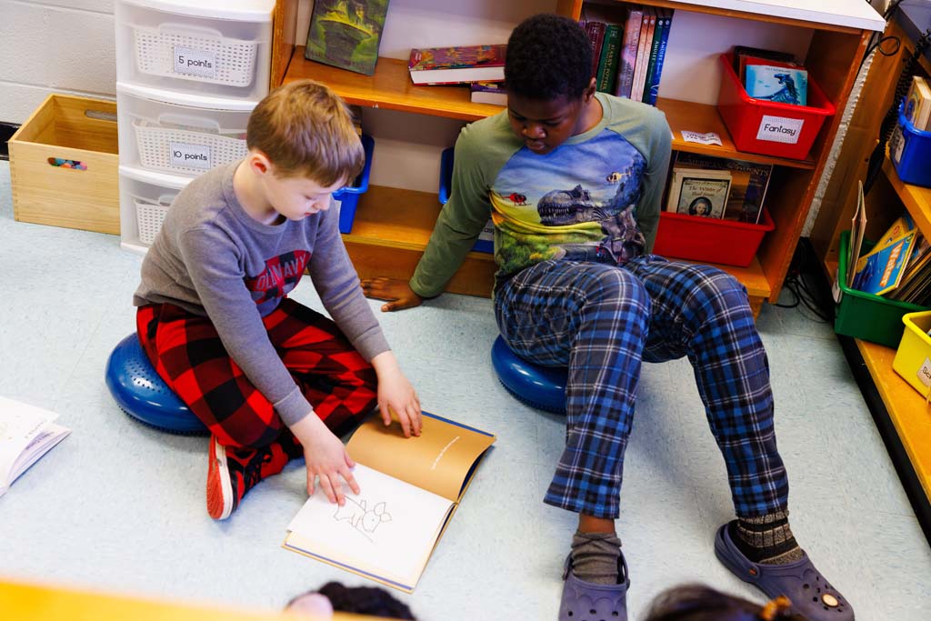students reading together