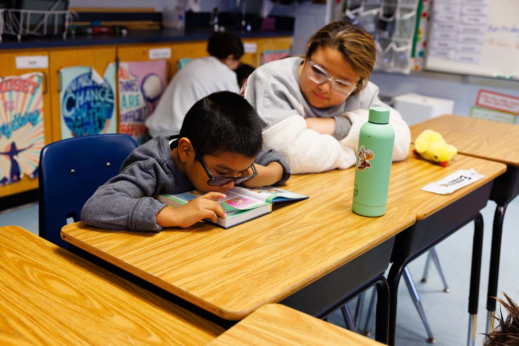 students reading together