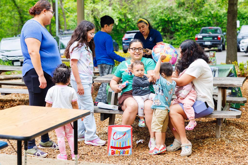 family at picnic bench