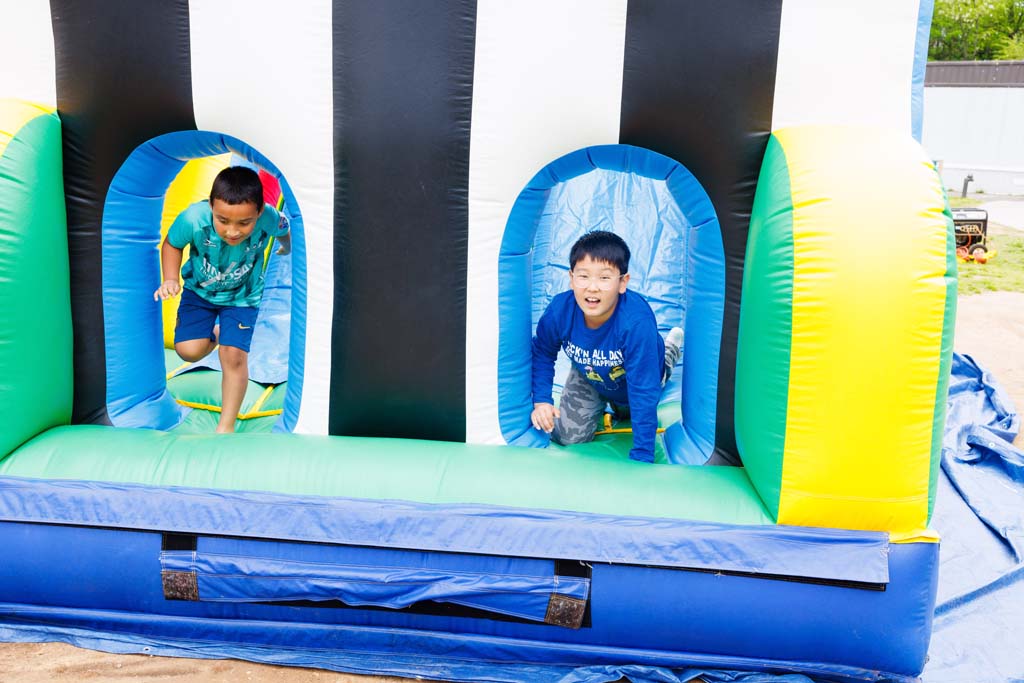 children on inflatable