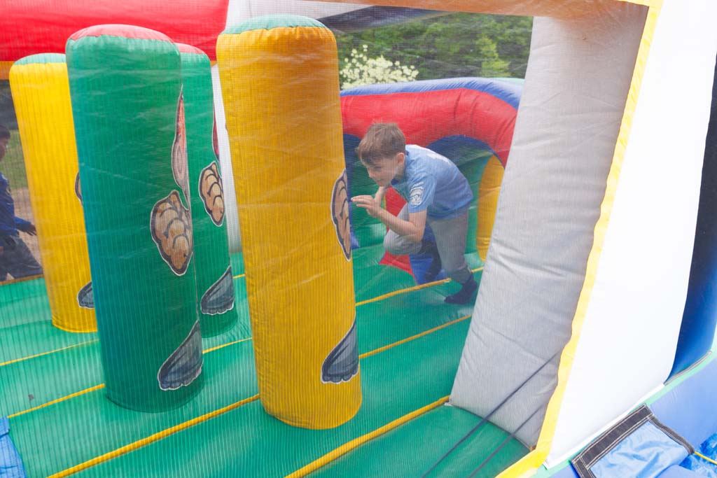 children on inflatable